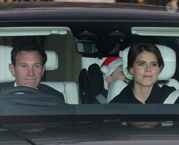 La princesse Eugenie d’York et son mari Jack Brooksbank - August Broksbank sleeps in his car seat as Princess Beatrice and Jack Brooksbank attend the Royal Family attend a Christmas Lunch at Buckingham Palace in London, UK, on the 19th December 2024.

Picture by James Whatling