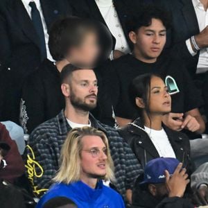 Natalie Portman et son fils Aleph, Christina Milian et son mari M. Pokora (Matt Pokora), Paul Mirabel - Célébrités dans les tribunes lors du match de qualification pour la Coupe du Monde 2026 entre la France et l'Islande (2-1) au Parc des Princes à Paris le 9 septembre 2025. © Lionel Urman/Bestimage