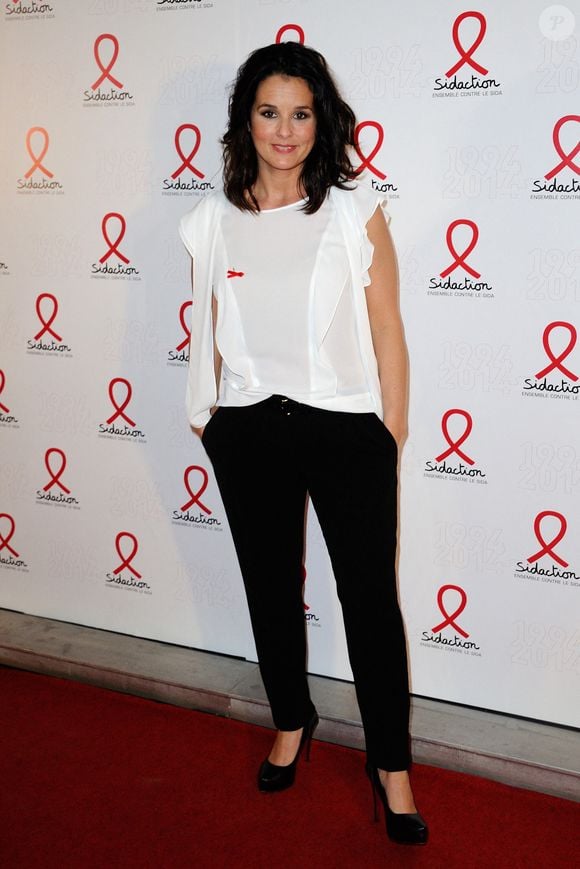 Faustine Bollaert pose lors d'un photocall pour le lancement du Sidaction 2014 et du 'Sidaction 20e anniversaire' qui s'est tenu au Musée du quai Branly à Paris, France, le 10 mars 2014. Photo par Aurore Marechal/ABACAPRESS.COM