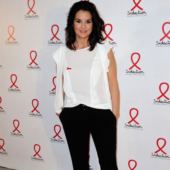 Faustine Bollaert pose lors d'un photocall pour le lancement du Sidaction 2014 et du 'Sidaction 20e anniversaire' qui s'est tenu au Musée du quai Branly à Paris, France, le 10 mars 2014. Photo par Aurore Marechal/ABACAPRESS.COM