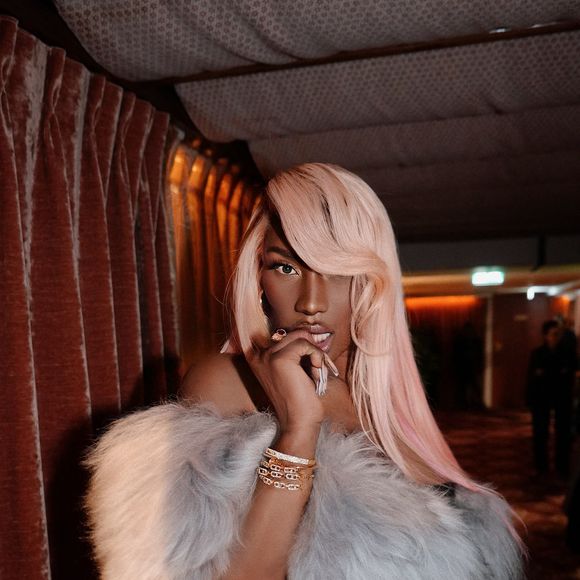 Aya Nakamura porte des bijoux Messika (bracelet Move Link trois rangs et un bangle Move Noa) lors d'une soirée privée au restaurant Dar Mima à l'intérieur de l'Institut du Monde Arabe à Paris, France, le 16 novembre 2024. © Messika via Bestimage