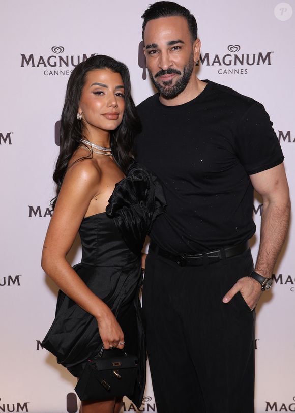 Adil Rami et Louana Franco - Photocall de la soirée "House of the Magnum" lors du 79ème Festival International du Film de Cannes, le 14 mai 2026.
© Denis Guignebourg/Bestimage