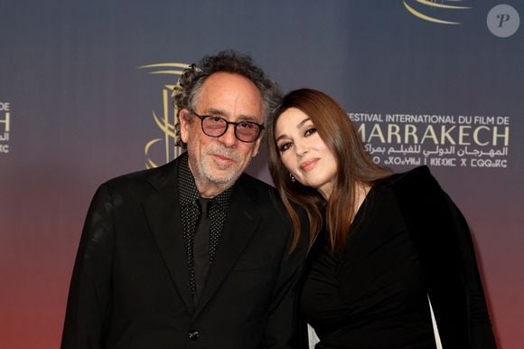 Tim Burton et Monica Bellucci au photocall de la cérémonie d'ouverture et à la projection du film "L'Ordre" lors du 21ème Festival international du film de Marrakech, le 29 novembre 2024j à Marrakech, Maroc. © Dominique Jacovides/Bestimage