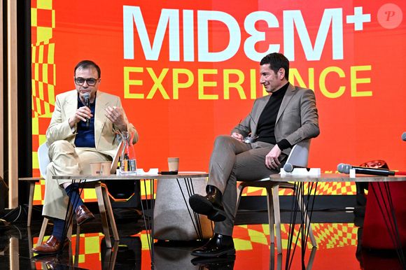 Bertrand Burgalat, David Lisnard, maire de Cannes et président du MIDEM+ - B.Burgalat, président du SNEP, producteur, musicien, compositeur et arrangeur français, D.Lisnard, maire de Cannes et président du MIDEM+ et B.Bahlouli, le rédacteur en chef de Rolling Stone, ont particpé à une conférence durant le MIDEM+24 au Palais des Festivals de Cannes, le 26 janvier 2024.© Bruno Bebert / Bestimage