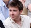 À seulement 22 ans, Oscar Bruel se fait un nom de son côté. 

Patrick Bruel et son fils Oscar dans les tribunes lors des Internationaux de France de Tennis de Roland Garros. Paris. © Dominique Jacovides/Bestimage