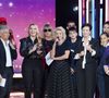 Pour rappel, l'année dernière, le Téléthon avait récolté près de 97 millions d'euros.

Sophie Davant, Nagui, Santa, Laurence Tiennot-Herment, Delphine Ernotte, Collectif Métissé lors de la deuxième soirée de la 39ème édition du Téléthon, le 6 décembre 2025. 

Photo : Anne-Sophie Guebey / Bestimage