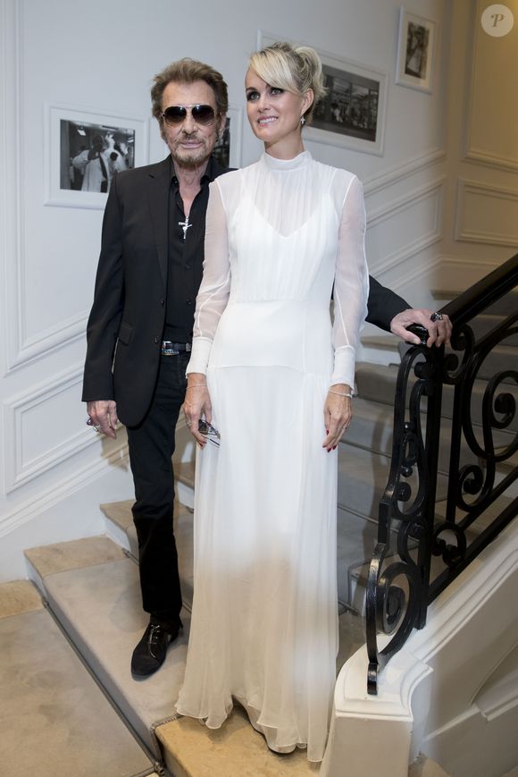 Johnny Hallyday et sa femme Laeticia Hallyday - People au défilé de mode Haute-Couture automne-hiver 2016/2017 "Christian Dior" à Paris. Le 4 juillet 2016 © Olivier Borde / Bestimage
