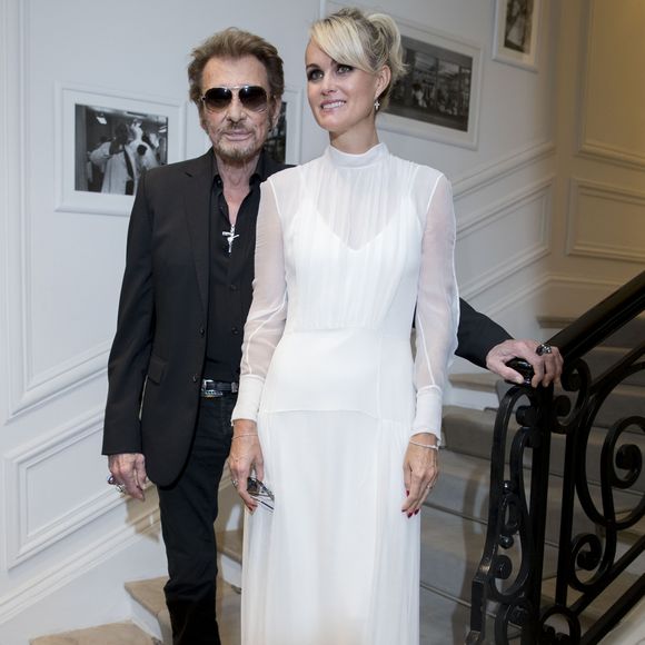 Johnny Hallyday et sa femme Laeticia Hallyday - People au défilé de mode Haute-Couture automne-hiver 2016/2017 "Christian Dior" à Paris. Le 4 juillet 2016 © Olivier Borde / Bestimage
