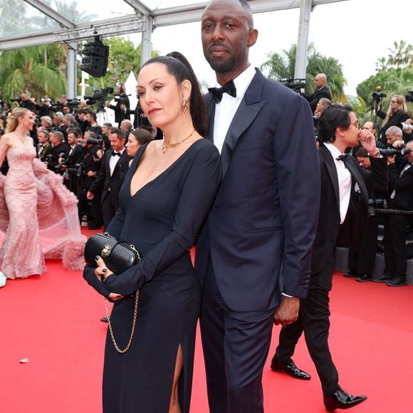 Karole Rocher et son mari Thomas Ngijol - Montée des marches du film « Highest 2 Lowest » lors du 78ème Festival International du Film de Cannes, au Palais des Festivals à Cannes. Le 19 mai 2025
© Jacovides-Moreau / Bestimage
