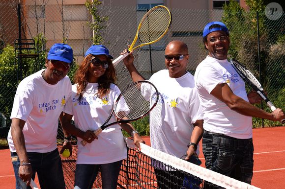Le groupe 'La Compagnie Créole' (Jose Sebeloue, Clemence Bringtowm, Guy Bevert et Julien Tarquin) lors du tournoi de tennis caritatif pour l'association 'Enfant, Star et Match' à Antibes, dans le sud de la France, le 08 juillet 2014. Photo par Patrice Masante/ABACAPRESS.COM