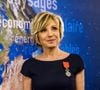 "Je n’ai jamais rien fait. Rien de rien. Jamais", a-t-elle déclaré. 

La présentatrice météo Evelyne Dheliat avec l'ordre de Chevalier de la Légion d'Honneur lors d'une cérémonie au siège du ministère, à Paris, France, le 24 janvier 2017. Photo par Samuel Boivin/ABACAPRESS.COM