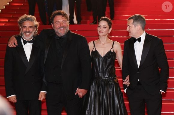 Leonardo Sbaraglia, Denis Ménochet, Marion Cotillard et Guillaume Canet - Descente des marches du film " Karma " lors du 79ème Festival International du Film de Cannes, le 15 mai 2026. © Jacovides-Moreau / Bestimage