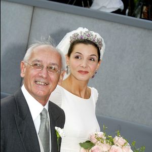 Clotilde Courau et son père - Mariage du prince Emmanuel-Philibert de Savoie et de Clotilde Courau à la basilique Sainte-Marie-des-Anges à Rome le 25 septembre 2003 © AGENCE / BESTIMAGE