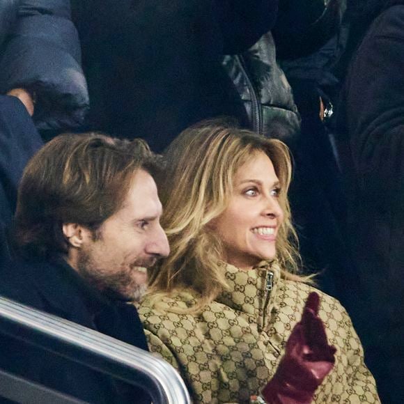 Ophélie Meunier et son mari Mathieu Vergne - Célébrités assistent au match de Ligue des champions entre le PSG et Manchester City (4-2) au Parc des Princes à Paris le 22 janvier 2025. © Cyril Moreau/Bestimage