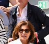 Diplômée de l’École de journalisme de Lille, elle a fait ses premières armes comme reporter sur le terrain, avant de devenir par la suite cheffe de rubrique du service culture de "TF1".

Gilles Bouleau et son épouse Elisabeth Tran-Bouleau dans les tribunes lors des Internationaux de France de tennis à Roland Garros le 28 mai 2022 à Paris, France. Photo by Laurent Zabulon/ABACAPRESS.COM