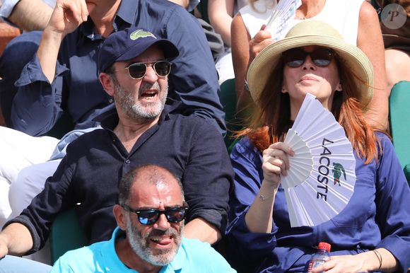 Bruno Solo et sa femme Véronique dans les tribunes lors des internationaux de France de Roland Garros à Paris, le 31 mai 2017.

© - Dominique Jacovides - Cyril Moreau/ Bestimage