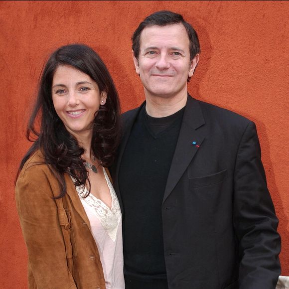 L'acteur français Francis Huster et son épouse l'actrice brésilienne Cristiana Reali arrivent à Roland Garros pour assister à la finale féminine des Internationaux de France de Tennis 2004 à Paris-France le samedi 5 juin 2004. Photo Gorassini-Zabulon/ABACA.