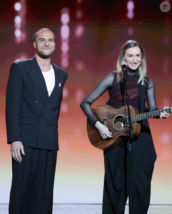 Exclusif - Amir Haddad et Philippine Lavrey - Enregistrement du concert "Nos voix pour toutes", au profit de La fondation des femmes, à l'Adidas Arena à Paris, diffusée le 11 décembre sur TMC
© Coadic Guirec-Cyril Moreau / Bestimage