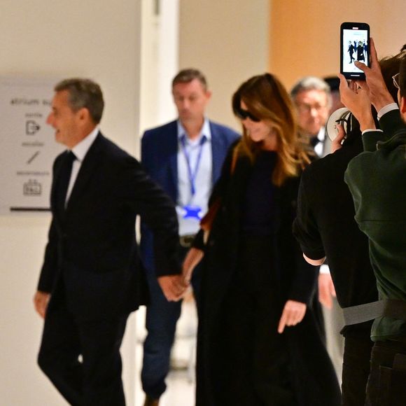 Nicolas Sarkozy et sa femme Carla Bruni au Tribunal judiciaire (Batignolles, 32ème chambre correctionnelle) pour l'annonce de la décision dans le cadre du procès Lybien le 25 septembre 2025.

© Christian Liewig / Bestimage