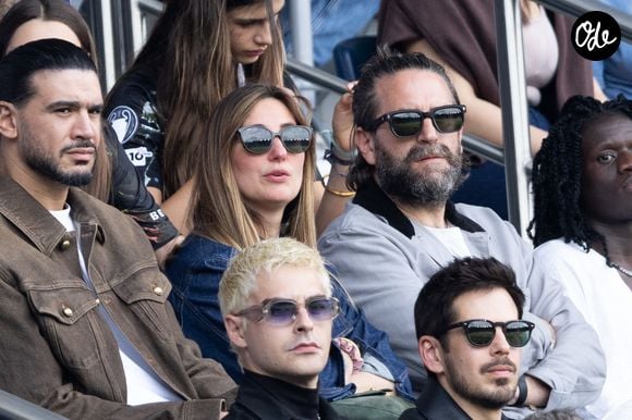 Marie Portolano et son mari Grégoire Ludig en tribunes du match de football Ligue 1 McDonald's opposant le Paris Saint-Germain (PSG) au FC Lorient (2-2) au Parc des Princes à Paris, France, le 2 mai 2026. © Bestimage