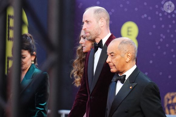 William avait assorti sa veste bordeaux à la ceinture de son épouse.

Le prince et la princesse de Galles assistant à la 79e cérémonie des British Academy Film Awards, au Royal Festival Hall, Southbank Centre, Londres, Royaume-Uni, le 22 février 2026. Photo par James Manning/PA Wire/ABACAPRESS.COM