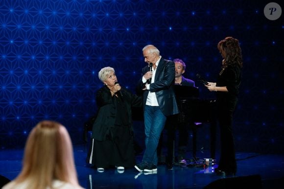 Michel Fugain a des choses à dire !

Exclusif - Mimie Mathy, Michel Fugain, Faustine Bollaert - Surprises - Enregistrement de l'émission "La Boîte à Secrets N°19" dans les studios de la Cité du Cinéma à Saint-Denis, présentée par F.Bollaert © Christophe Clovis / Bestimage