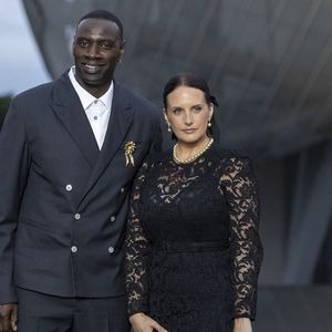 Omar Sy et sa Helene (bijoux Tasaki) - Photocall du dîner "Prelude pour les JO" à la Fondation Vuitton à Paris, France, le 25 juillet 2024. © Olivier Borde/Bestimage