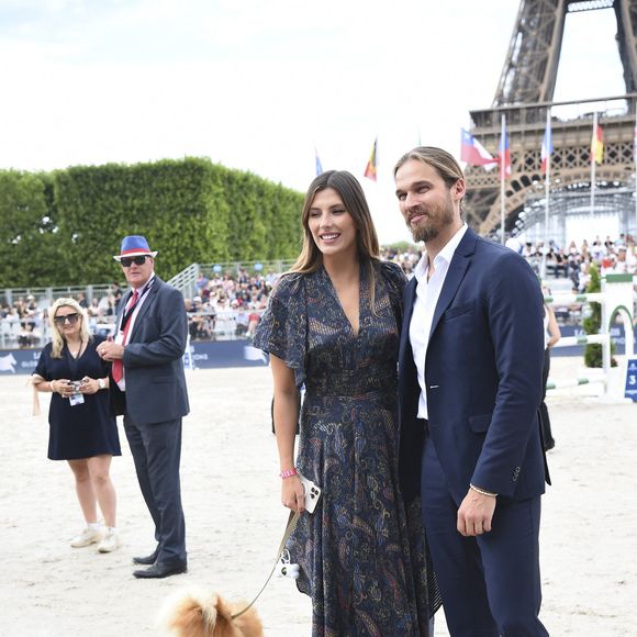 l'ancienne Miss France Camille Cerf (ambassadrice Jumping 2022) et son compagnon Theo Fleury - Prix Saint Laurent Eiffel Challenge CSI5 lors de la 8ème édition du "Longines Paris Eiffel Jumping" au Champ de Mars à Paris le 26 juin 2022.

© JB Autissier / Panoramic / Bestimage