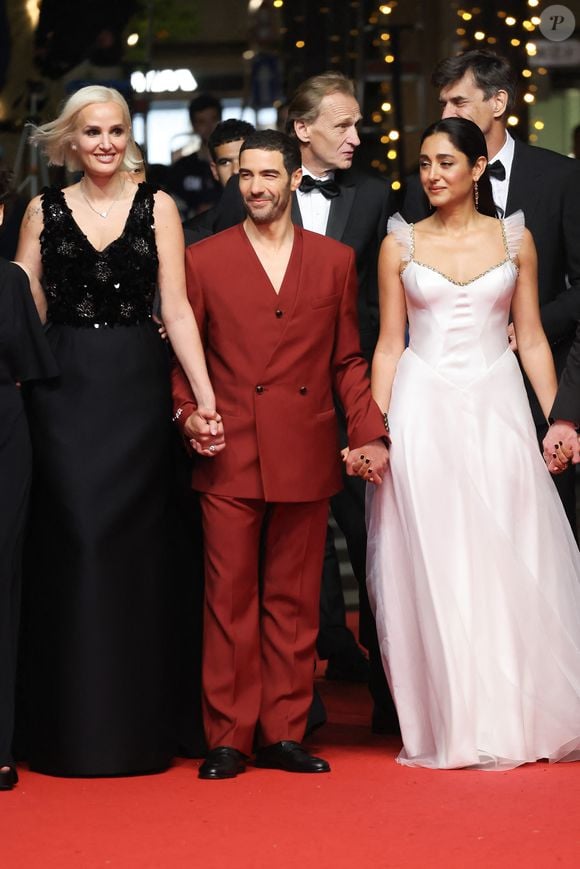 Julia Ducournau, Tahar Rahim, Golshifteh Farahani - Montée des marches du film « Alpha » lors du 78ème Festival International du Film de Cannes, au Palais des Festivals à Cannes. Le 19 mai 2025
© Jacovides-Moreau / Bestimage