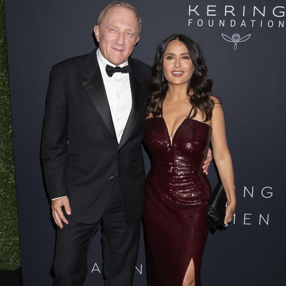 Salma Hayek et son mari Francois-Henri Pinault au photocall du 2ème dîner caritatif "Caring for Women" au profit de la Fondation Kering à New York, le 12 septembre 2023. Action Press / Bestimage