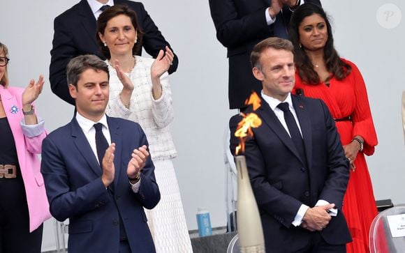 Amélie Oudea-Castera, Prisca Thévenot, Gabriel Attal, Emmanuel Macron en tribune présidentielle lors de la cérémonie du 144ème défilé militaire du 14 juillet, jour de la Fête Nationale, avenue Foch à Paris, France, le 14 juillet 2024. © Dominique Jacovides/Bestimage