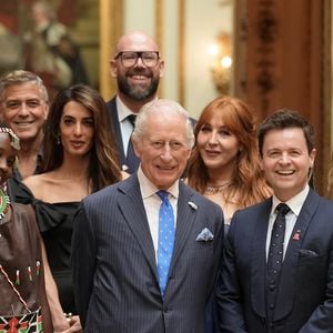 George Clooney et Amal Clooney lors de la réception en l'honneur des lauréats des King's Trust Awards au palais de Buckingham le 25 juin 2025  Stefan Rousseau/WPA-Pool/Bestimage