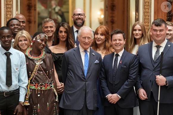 George Clooney et Amal Clooney lors de la réception en l'honneur des lauréats des King's Trust Awards au palais de Buckingham le 25 juin 2025  Stefan Rousseau/WPA-Pool/Bestimage