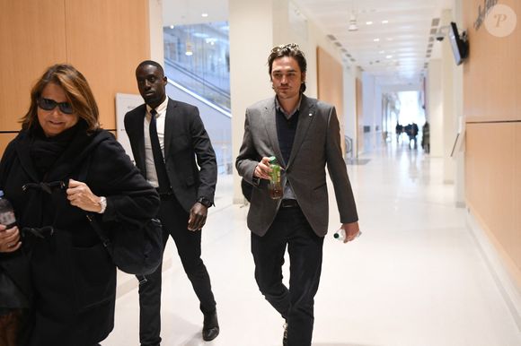 Alain-Fabien Delon et son avocate Florence Watrin arrivent au tribunal correctionnel de Paris pour avoir enregistré et diffusé avec son frère Anthony Delon une conversation de leur sœur, Anouchka, avec leur père, le 5 janvier 2024, à l'époque où les désaccords de la fratrie concernant la santé d'Alain Delon, à Paris, France, le 17 mars 2026. Anthony Delon et Anouchka sont absents. © Clément Prioli/Bestimage