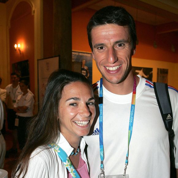 "On a refait nos vies depuis"

Le champion olympique français de canoë Tony Estanguet et Laetitia assistent à une fête au Club France à Athènes-Grèce pendant les Jeux Olympiques d'Athènes. Photo par Hahn-Nebinger-Zabulon/ABACA.