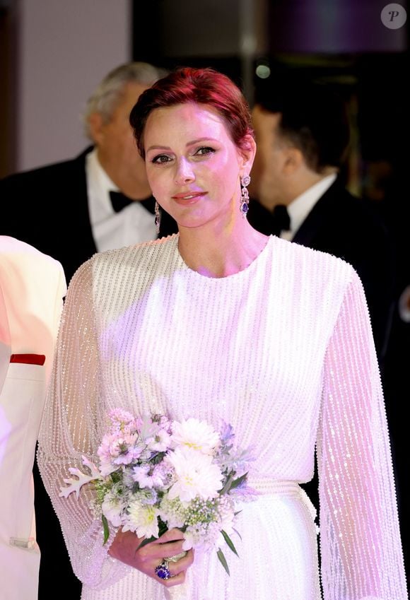 La princesse Charlène de Monaco lors du 74ème Gala de la Croix-Rouge Monégasque, qui se tient dans la mythique Salle des Etoiles du Sporting Monte-Carlo à Monaco. Cette année l'ambassadeur du gala n'est autre que la rock star internationale Robbie Wiliams. En cette occasion Robbie Williams a donné un concert exclusif à la Salle des Etoiles. Monaco © Dominique Jacovides/Bestimage