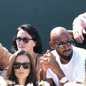 Nicolas Anelka et sa femme Barbara - La France a remporté la demi-finale de la Coupe Davis face à la République tchèque à Roland Garros à Paris, le 13 septembre 2014. Jo-Wilfried Tsonga et Richard Gasquet ont gagné le double et obtiennent ainsi leur place pour la finale.
JACOVIDES-MOREAU / BESTIMAGE