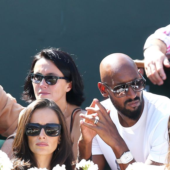 Nicolas Anelka et sa femme Barbara - La France a remporté la demi-finale de la Coupe Davis face à la République tchèque à Roland Garros à Paris, le 13 septembre 2014. Jo-Wilfried Tsonga et Richard Gasquet ont gagné le double et obtiennent ainsi leur place pour la finale.
JACOVIDES-MOREAU / BESTIMAGE