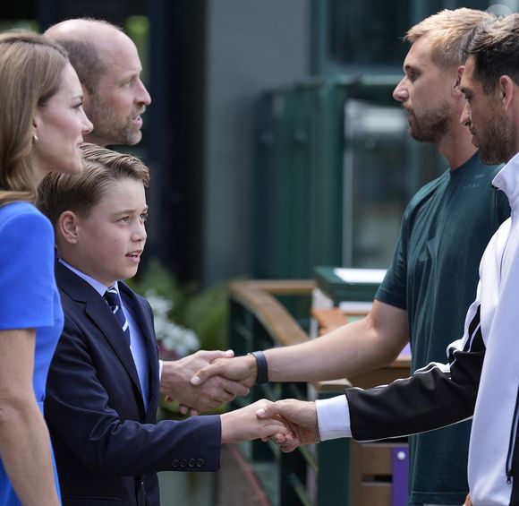 Le Prince et la Princesse de Galles (Le prince William, prince de Galles, et Catherine (Kate) Middleton, princesse de Galles), le Prince George (Le prince George de Galles) et la Princesse Charlotte (La princesse Charlotte de Galles) regardent la finale masculine de Wimbledon entre Jannik Sinner et Carlos Alcaraz, au All England Lawn Tennis and Croquet Club, Wimbledon, Londres, Royaume-Uni, le 13 juillet 2025.