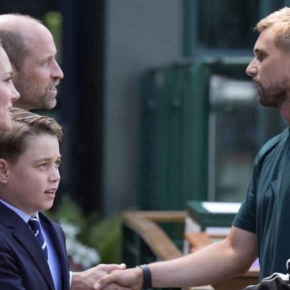 Le Prince et la Princesse de Galles (Le prince William, prince de Galles, et Catherine (Kate) Middleton, princesse de Galles), le Prince George (Le prince George de Galles) et la Princesse Charlotte (La princesse Charlotte de Galles) regardent la finale masculine de Wimbledon entre Jannik Sinner et Carlos Alcaraz, au All England Lawn Tennis and Croquet Club, Wimbledon, Londres, Royaume-Uni, le 13 juillet 2025.