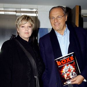 Laurence Boccolini et Gérard Louvin arrivent au stade de Levallois  Levallois-France, 14 novembre 2003 © Giancarlo Gorassini/ABACA