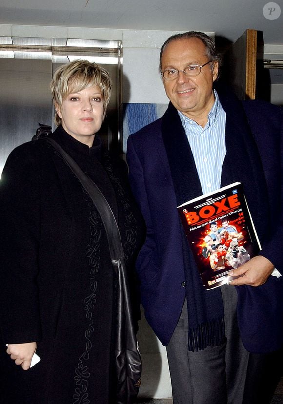 Laurence Boccolini et Gérard Louvin arrivent au stade de Levallois  Levallois-France, 14 novembre 2003 © Giancarlo Gorassini/ABACA