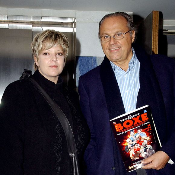 Laurence Boccolini et Gérard Louvin arrivent au stade de Levallois  Levallois-France, 14 novembre 2003 © Giancarlo Gorassini/ABACA