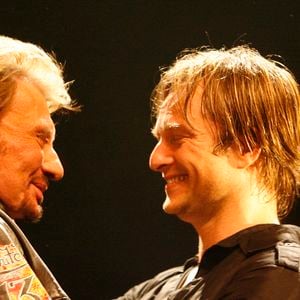 David Hallyday et son père Johnny Hallyday sur la scène de la Cigale à Paris le 17 mars 2008. Photo by Marco Vitchi/ABACAPRESS.COM