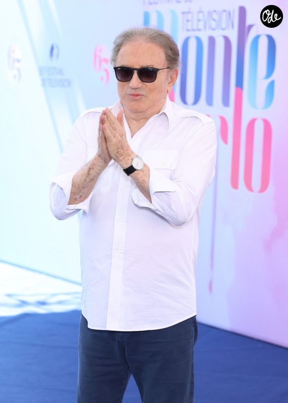 découvrez les lieux qui ont compté dans la vie de l'animateur iconique.

Michel Drucker - Photocall pour sa Nymphe d'honneur au Grimaldi Forum lors de la 65eme édition du Festival TV De Monte Carlo le 13 Juin 2026 © Denis Guignebourg /Bestimage
