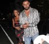 En 2022, c’est avec Jordan Ozuna, mannequin du Maryland, que Karim Benzema s’affiche...
Exclusif - Karim Benzema et Jordan Ozuna quittent le restaurant "Giorgio Baldi" à Santa Monica, après un dîner romantique, le 27 juillet 2022. Photographe : Backgrid USA / Bestimage