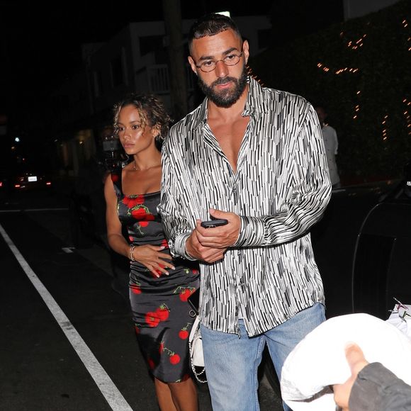 En 2022, c’est avec Jordan Ozuna, mannequin du Maryland, que Karim Benzema s’affiche...

Exclusif - Karim Benzema et Jordan Ozuna quittent le restaurant "Giorgio Baldi" à Santa Monica, après un dîner romantique, le 27 juillet 2022. Photographe : Backgrid USA / Bestimage