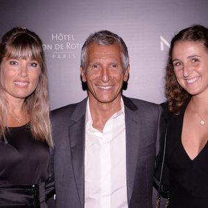 À la différence de ses parents, Nina n'a pas choisi de faire carrière sous les projecteurs.

Exclusif - Nagui avec sa femme Mélanie Page et sa fille Nina Fam - Moma Group fête son 10ème anniversaire à l'hôtel Salomon de Rothschild à Paris. © Rachid Bellak/Bestimage