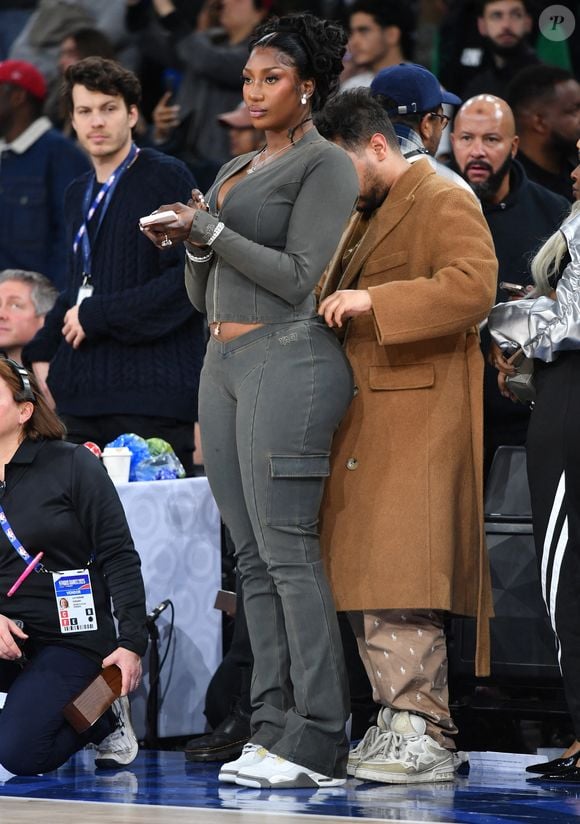 Aya Nakamura et son styliste Ayoub Agourram - Match de gala NBA Jam team Teddy Riner contre team Esteban Ocon lors du NBA Paris Games 2025 à L'Accor Arena Bercy le 24 janvier 2025 © Ramsamy Veeren / Bestimage