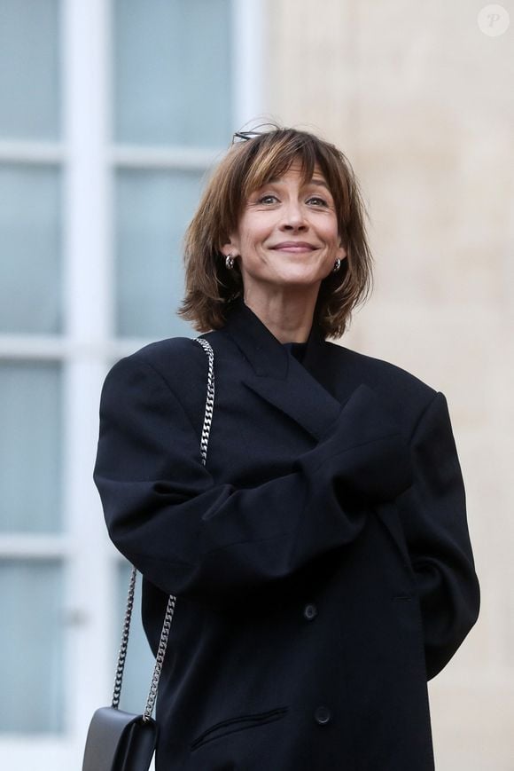 L'actrice Sophie Marceau - Arrivée des invités au dîner d'Etat en l'honneur du président chinois Xi Jinping et de sa femme la Première Dame Peng Liyuan au palais présidentiel de l'Elysée à Paris © Stéphane Lemouton / Bestimage